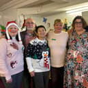 Attendees and volunteers enjoy their Christmas party at the Melton's Pepper's - A Safe Place centre with Jenny Hendry (second from right)