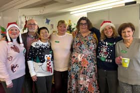 Attendees and volunteers enjoy their Christmas party at the Melton's Pepper's - A Safe Place centre with Jenny Hendry (second from right)