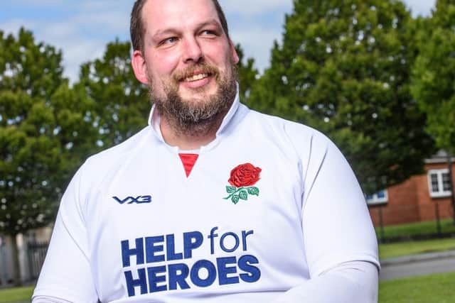 Tom Folwell models one of the new Help for Heroes shirts