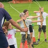 An archery session at a previous summer activities scheme organised by Belvoir Cricket & Countryside Trust