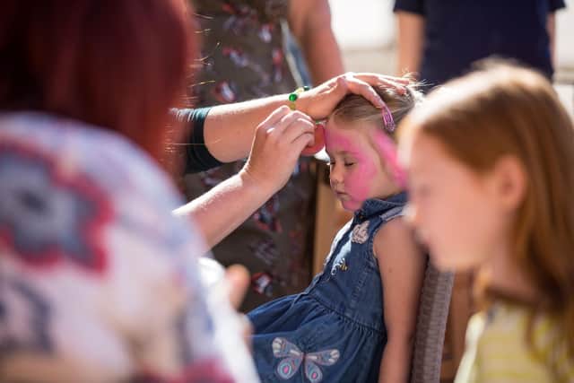 Face painting at a previous Father's Day event at Belvoir Castle