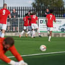 Melton Town celebrate their equaliser on Saturday.