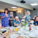 Members of the Melton Parkinson's support group enjoy afternoon tea courtesy of Barratt Homes