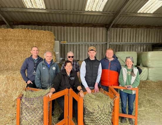 Glebe House members and Brooksby students with the handmade hay net racks