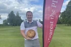 Mark Poolan won the giant pork pie at the open.
