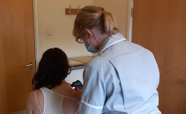 Patient Lucy Drewery undergoes the revolutionary new AI skin cancer diagnosis test which is now available to Melton patients