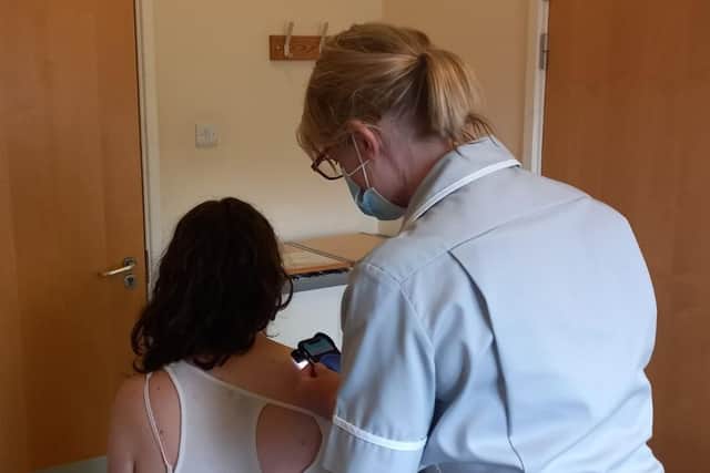 Patient Lucy Drewery undergoes the revolutionary new AI skin cancer diagnosis test which is now available to Melton patients