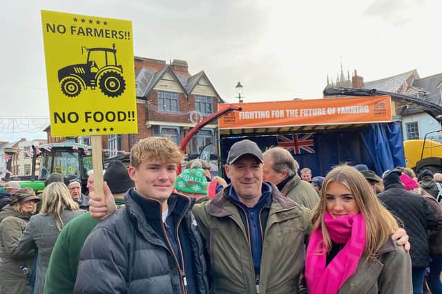 Joe Morley, of Old Dalby Lodge Farm, pictured at the Melton protest with son Fraser and daughter Nina