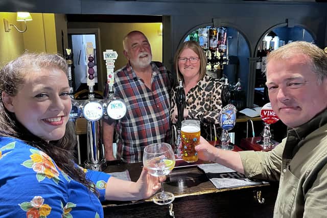 Melton MP Alicia Kearns enjoys a drink on the reopening day at The Bell at Frisby with mine hosts Lucy and Gordon Jackson plus pub operations manager Steve Hardy