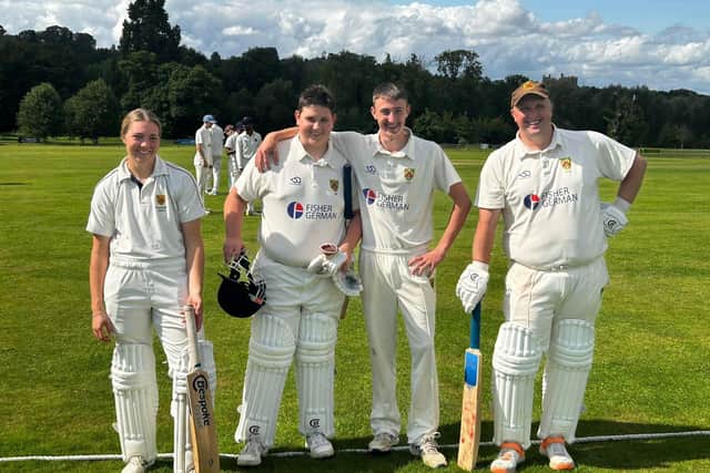 Scott Moore poses proudly with daughter Ellie and sons, Logan and Corie, as they all played together for the first time for Barkby United on Sunday