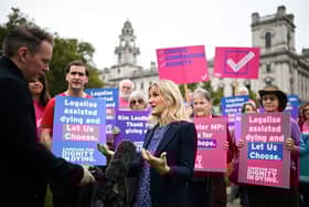 Labour MP Kim Leadbeater speaks to the press during a gathering in favour of the proposal to legalise euthanasia in the UK, called by campaigners from "Dignity in Dying", outside The Palace of Westminster, home to the Houses of Parliament in central London, on October 16, 2024. A new proposal to legalise assisted dying in England and Wales is introduced in the UK parliament on October 16, 2024, sparking concern from senior church leaders and opponents about the implications of allowing the terminally ill to die on their own terms. Lawmakers in the House of Commons will get a free vote on Labour MP Kim Leadbeater's Terminally Ill Adults (End of Life) Bill, allowing them to vote with their conscience rather than along party political lines. (Photo by JUSTIN TALLIS / AFP) (Photo by JUSTIN TALLIS/AFP via Getty Images)