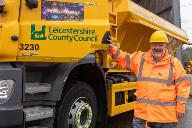 Councillor Ozzy O'Shea with one of Leicestershire County Council's gritting lorries
