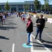 Thousands of shoppers were seen queuing for reopened shops in England