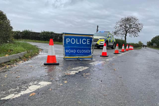 A police roadblock this week at P,lungar after the discovery of Timothy Macdonald's body in a field
PHOTO GEORGE ICKE