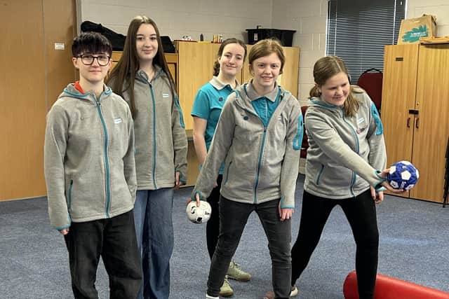 Members of Melton Girlguides enjoying an activity at their latest meeting