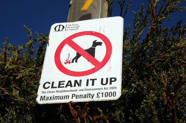 A Melton Borough Council sign warning against allowing dog fouling