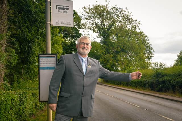 Councillor Charles Whitford pictured at a bus stop in Leicestershire