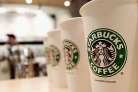 Starbucks coffee cups (Photo by Stephen Chernin/Getty Images)