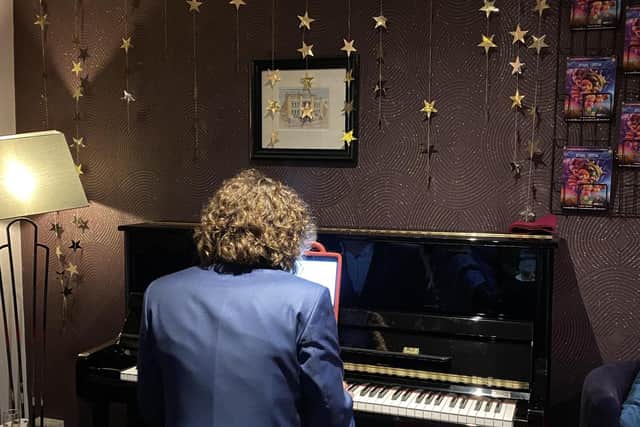 Jacob Mundin plays movie songs at the 10th birthday party at The Regal