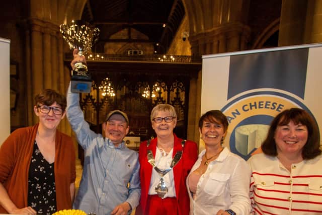 Original Yorkshire Blue, made by Shepherds Purse from Yorkshire, wins the Supreme Champion title at this year's Artisan Cheese Awards at Melton Mowbray - also pictured is Mayor of Melton, Councillor Siggy Atherton