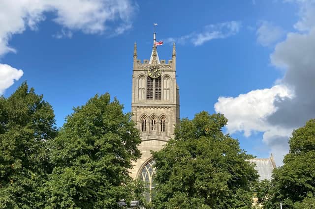 St Mary's Church, Melton, with its flag at half-mast as a mark of respect for The Queen