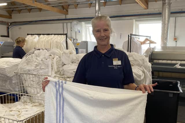 Carol Bowes at work in the laundry at Ragdale Hall Spa, where she's worked for 50 years