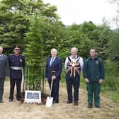 Lord Lieutenant of Leicestershire, Mike Kapur, pictured after helping plant at Platinum Jubilee tree in Egerton Park with Melton Town Estate representatives and Mayor, Councillor Alan Hewson