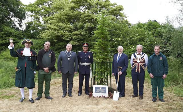 Lord Lieutenant of Leicestershire, Mike Kapur, pictured after helping plant at Platinum Jubilee tree in Egerton Park with Melton Town Estate representatives and Mayor, Councillor Alan Hewson