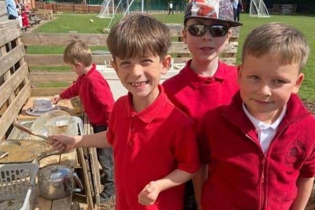 Great Dalby Primary School enjoying their mud kitchens