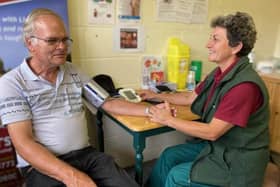 Nurse Heather Dawes carries out a blood pressure check at Melton Livestock Market