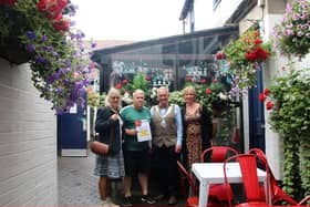 Melton's Hidden Gem competition winners back in 2022, the Half Moon, receive their award