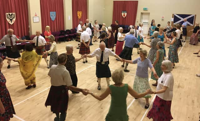 A session of Scottish country dancing at Waltham village hall