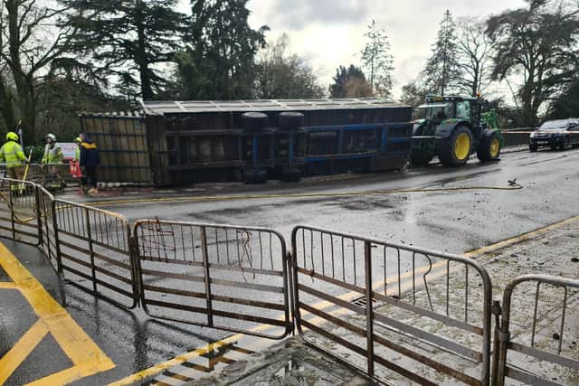 The overturned agricultural trailer on Lady Wilton Bridge in Melton this morning IMAGE John Southerington