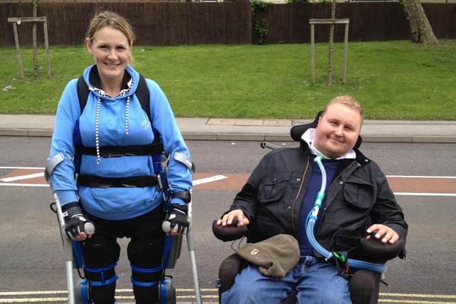 Claire Lomas (left) with Matt Hampson - both became inspiring fundraisers after being paralysed
