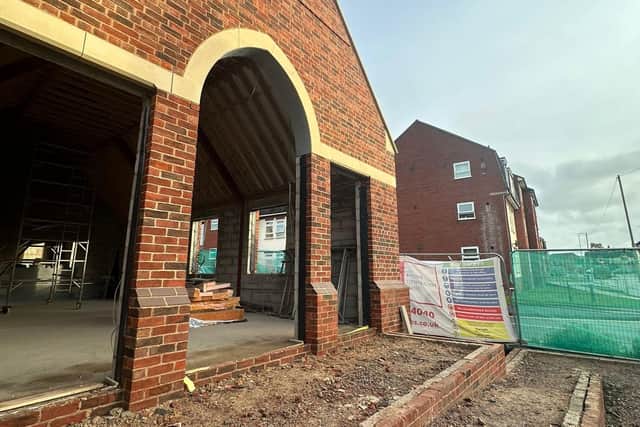 The entrance to the new community hall, which should be bult by January