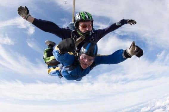 Malise Graham (below) pictured during his fundraising parachute jump in 2019 for Rainbows Hospice when he was Mayor of Melton