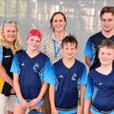 From the left, with one of the new starting block covers at Melton's Waterfield Leisure Centre, Tracy McGhie (head coach), Cordy R, Becky Fox (Spire Leicester Hospital), Freddie W,  Luke Millett (deputy head coach) and Conrad R