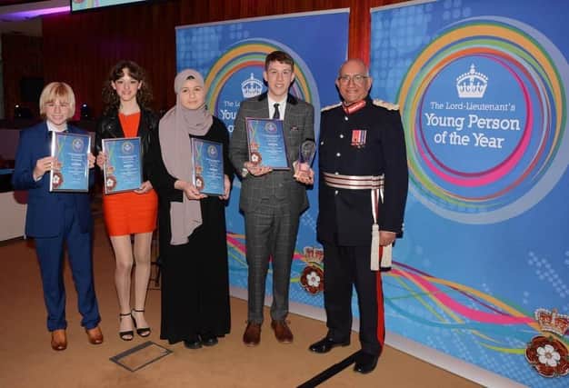 Lord Lieutenant of Leicestershire, Mike Kapur, with winners of last year's young person awards, from left, Clem Beardmore, Jessica Mawby, Sofia Omar and Joshua Bailey