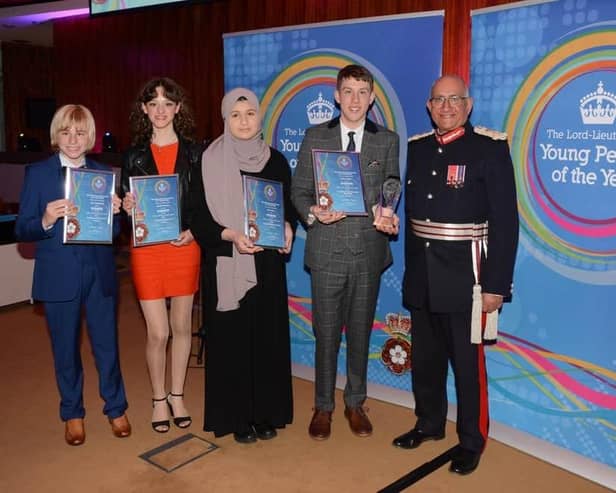 Lord Lieutenant of Leicestershire, Mike Kapur, with winners of last year's young person awards, from left, Clem Beardmore, Jessica Mawby, Sofia Omar and Joshua Bailey
