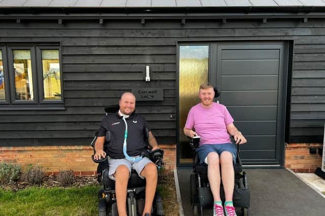 Niall (right), the first beneficiary to stay at the new lodges at the Get Busy Living Centre, with charity founder, Matt Hampson
