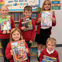 Poppy wins £1,000 worth of books and magazines for her village school