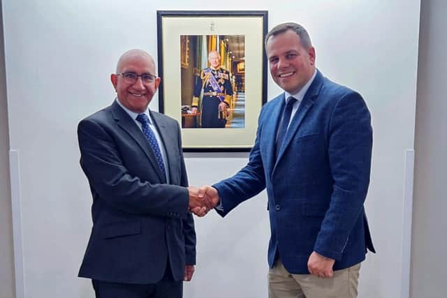 HMS Daring's Commanding Officer, Cdr Graeme Hazelwood (right), meets Mike Kapur, Lord Lieutenant of Leicestershire