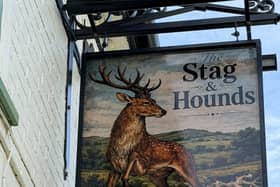 The new pub sign af Burrough's refurbished The Stag & Hounds