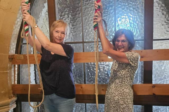 Two of the new bell ringers at Kirby Bellars