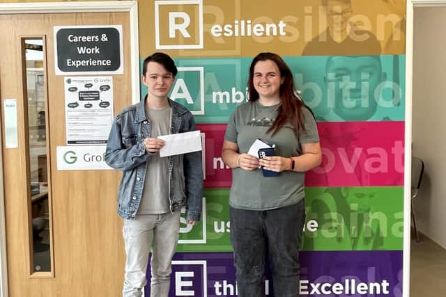 Cono Brown (left) and Savannah Ward celebrate exam results at SMB College Group's Brooksby campus