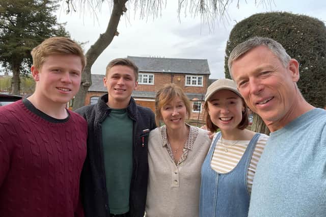 Cancer survivor Andrew King with his wife Fiona and their sons Jamie and Alex and daughter Mia