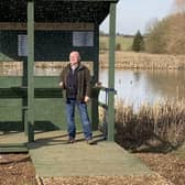 Paul Stammers and Steve Murphy toast the opening of the new bird hide at Melton Country Park