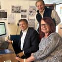 Melton and Syston MP Ed Argar (seated), having the online budget planner demonstrated to by MADMAC CEO Amanda Heath and trustee David Chubb