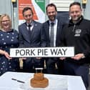 Roads Minister, Simon Lightwood MP (second from right) and Dickinson and Morris Ye Olde Pork Shoppe manager Richard Griffiths (extreme right) pictured at the launch event today
