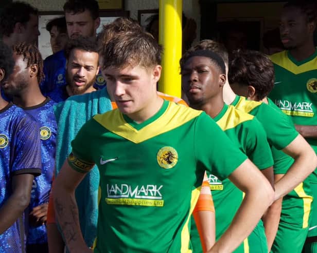 New club captain Brook Isherwood leads out Holwell Sports.